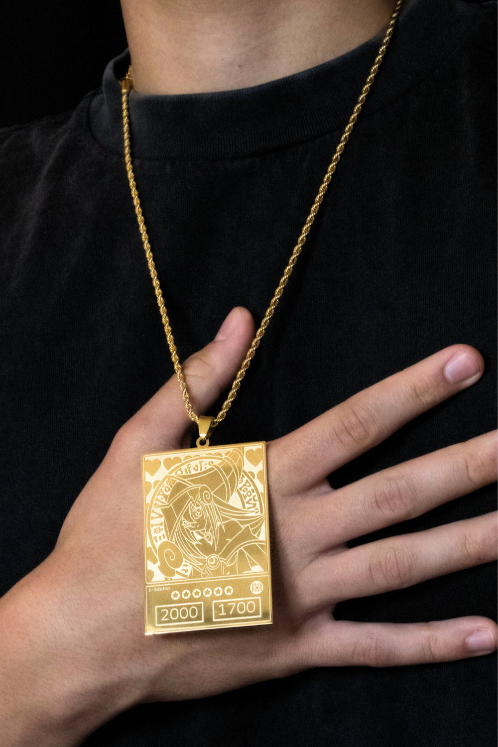 DMG card pendant in hand to show its size