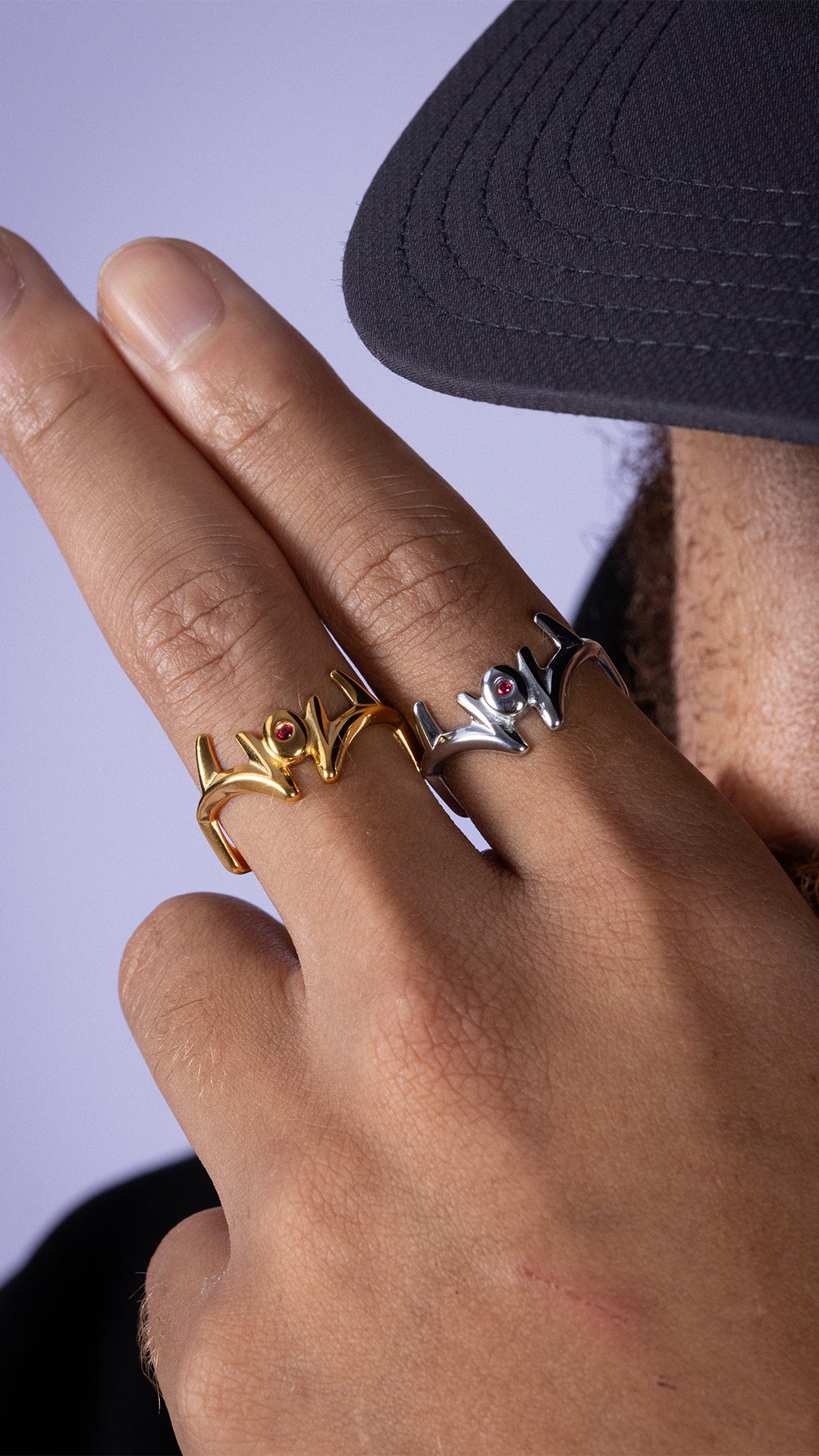 MALEVOLENT rings in gold and silver, worn