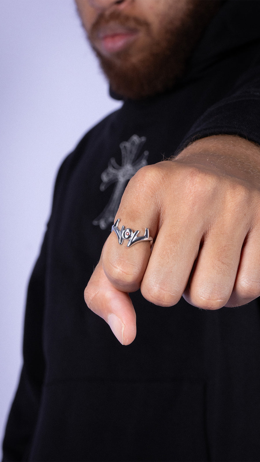 MALEVOLENT silver ring worn on hand